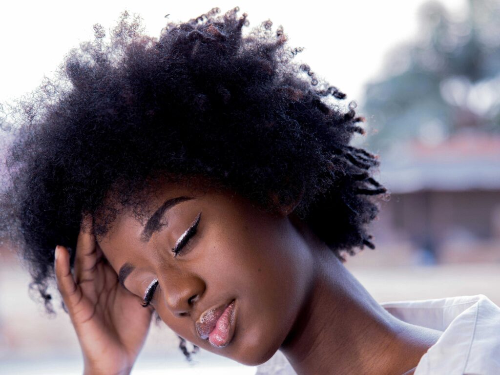 photo of lady with afro hair