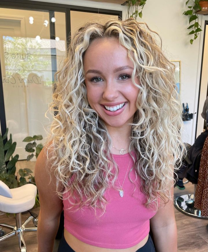 woman with long deep wavy hair