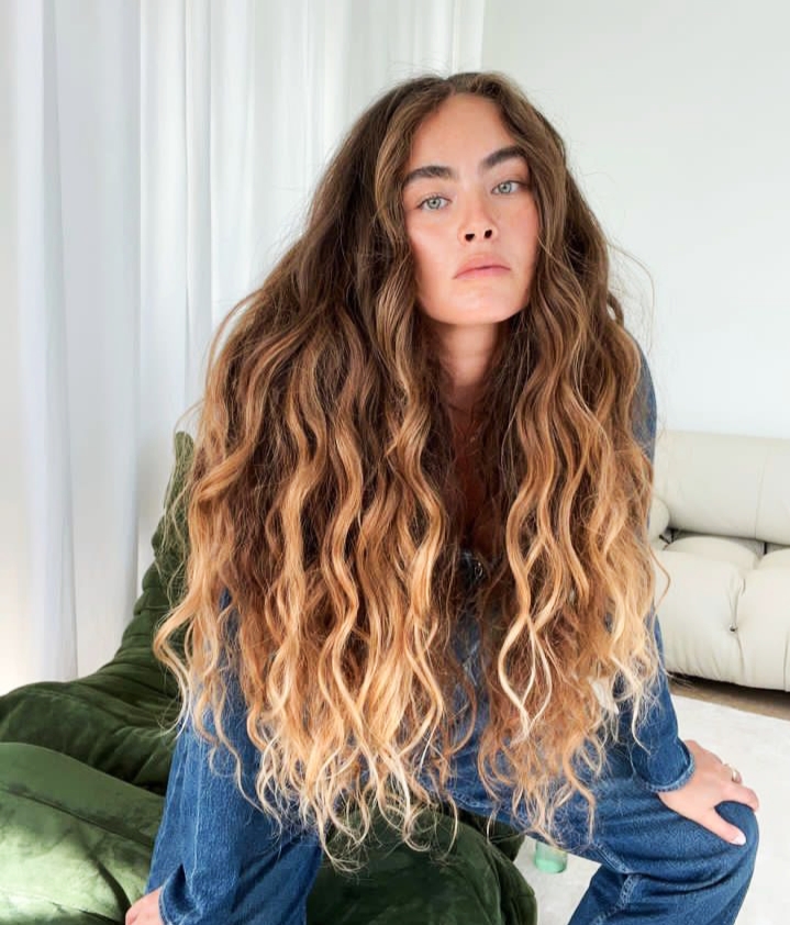 woman with long brown wavy hair