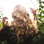 back view of woman with wavy hair