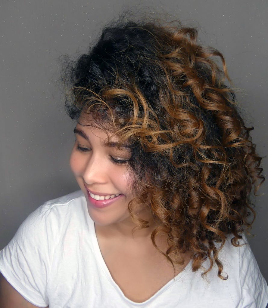 side view of Woman with curly hair