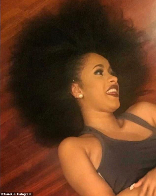 Cardi b with an afro