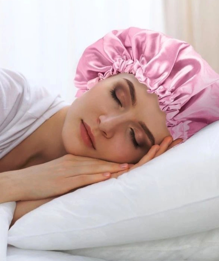 woman sleeping with satin bonnet