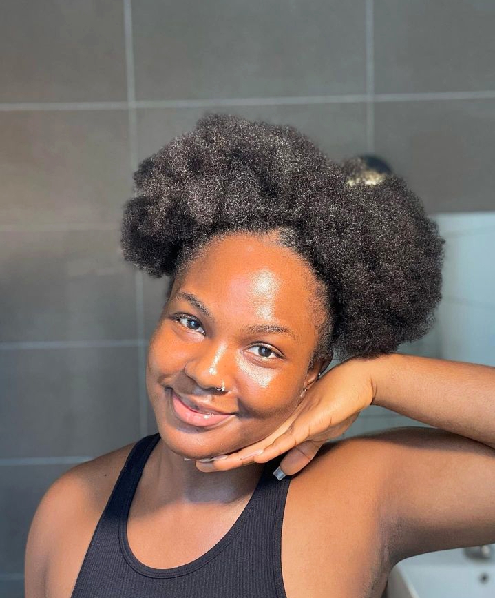 Double high puff hairstyle on natural hair