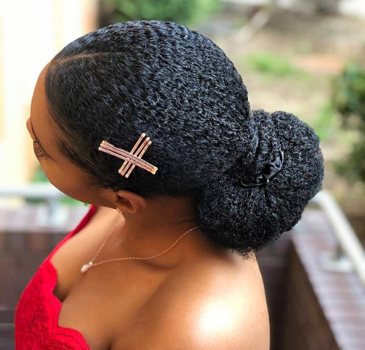 Slicked back low bun on natural hair